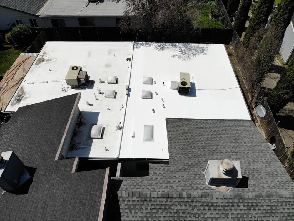 Slide of Flat Roof Pros