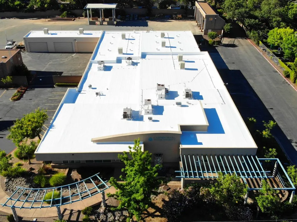 Slide of Flat Roof Pros