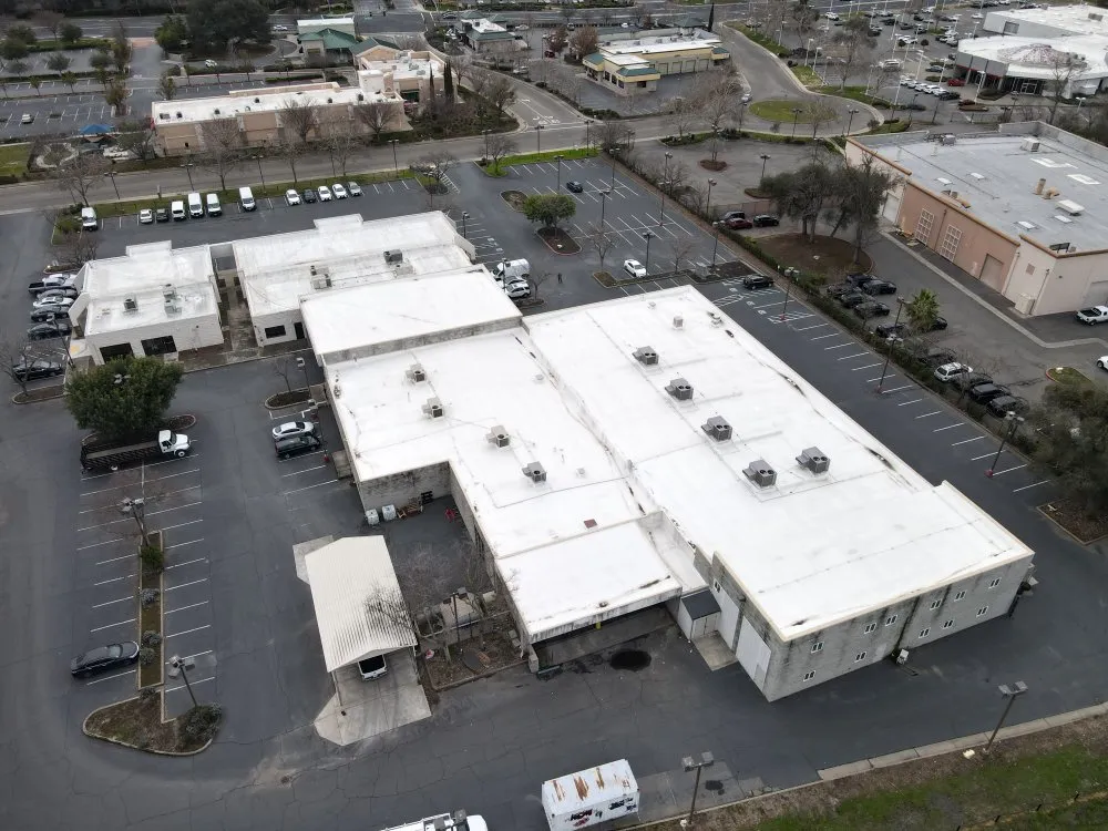 Slide of Flat Roof Pros