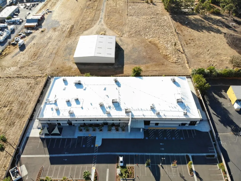 Slide of Flat Roof Pros