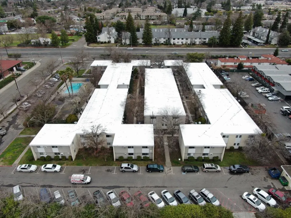 Slide of Flat Roof Pros