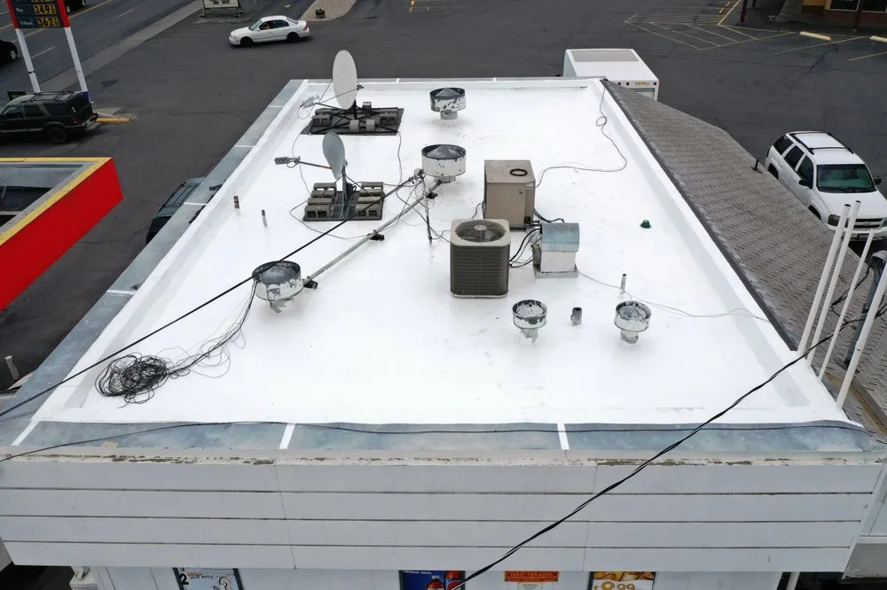 Slide of Flat Roof Pros