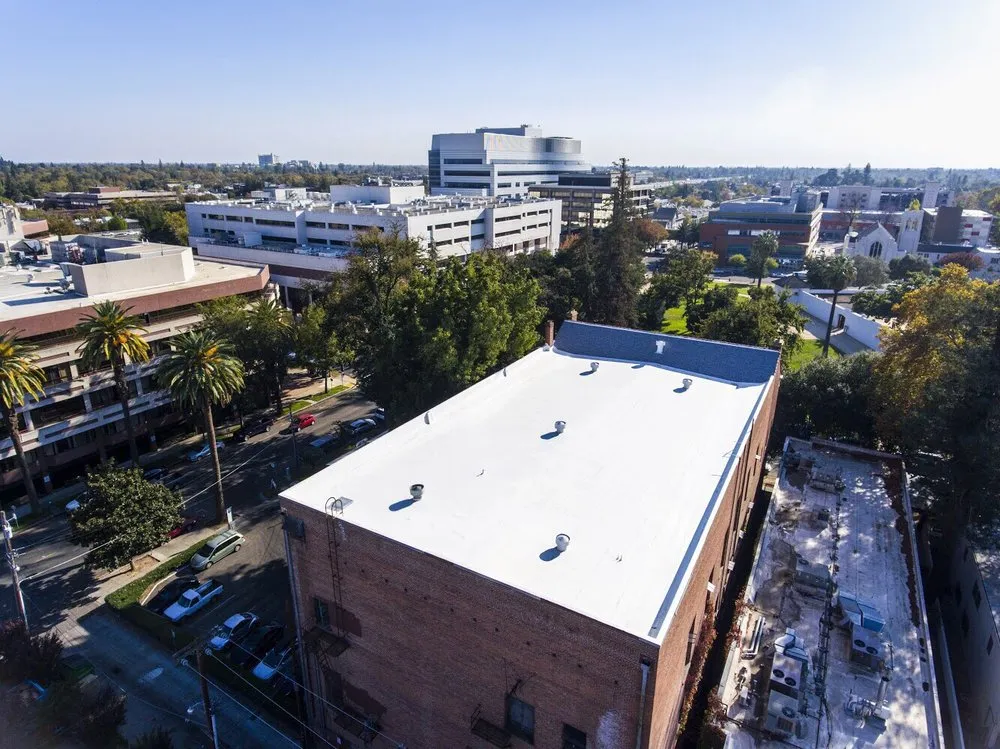 Slide of Flat Roof Pros