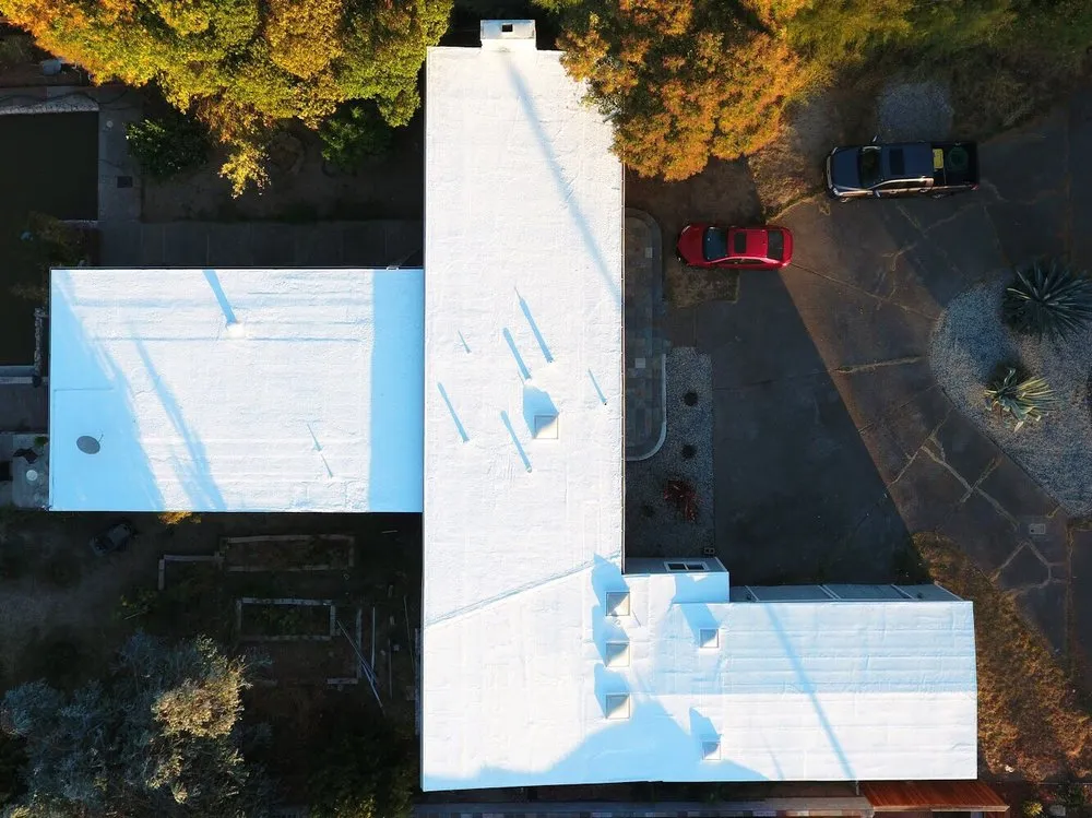 Slide of Flat Roof Pros