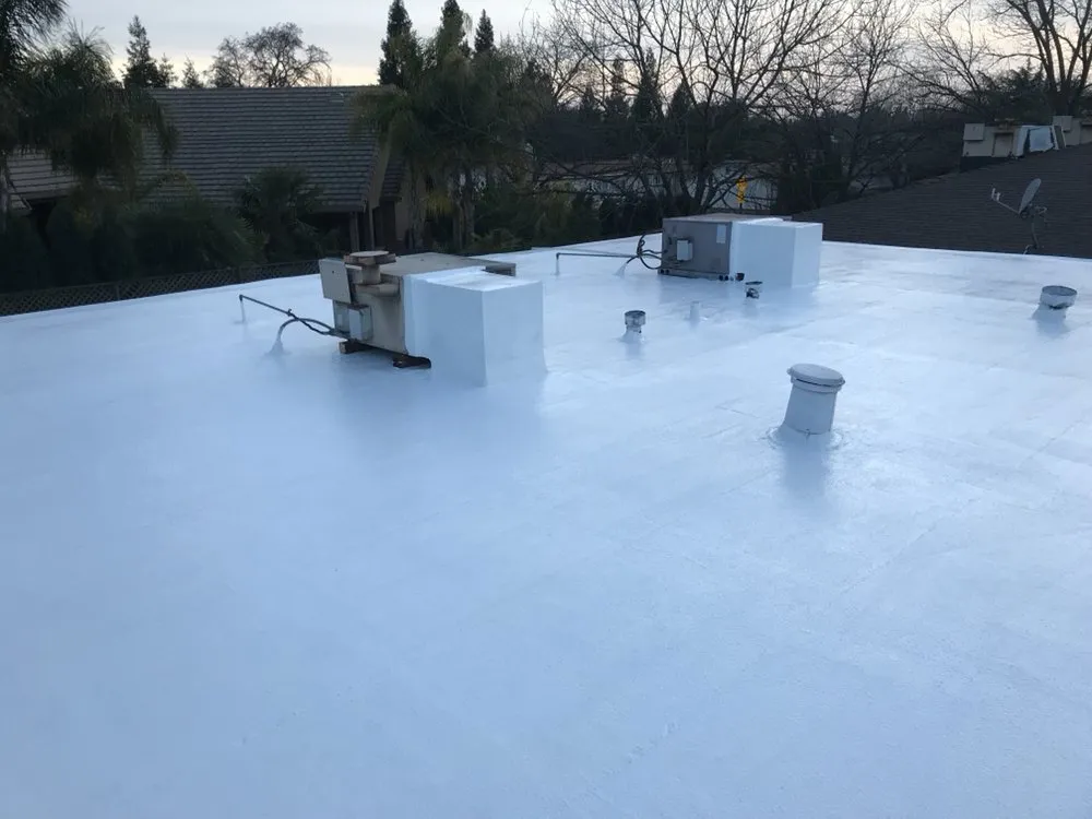 Slide of Flat Roof Pros