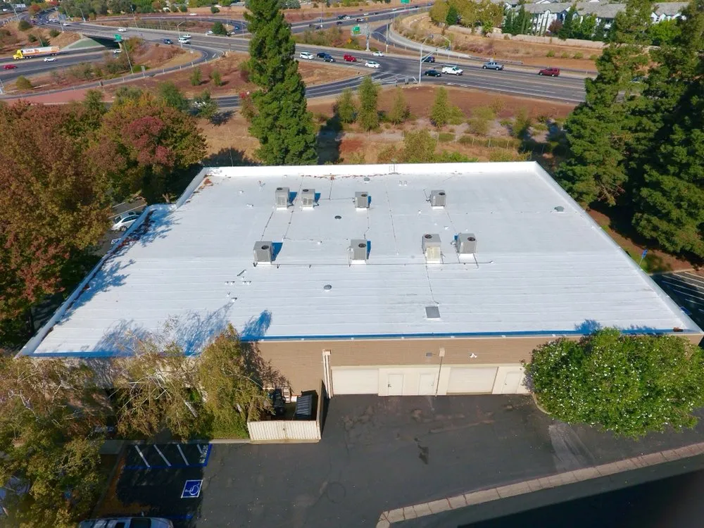 Slide of Flat Roof Pros