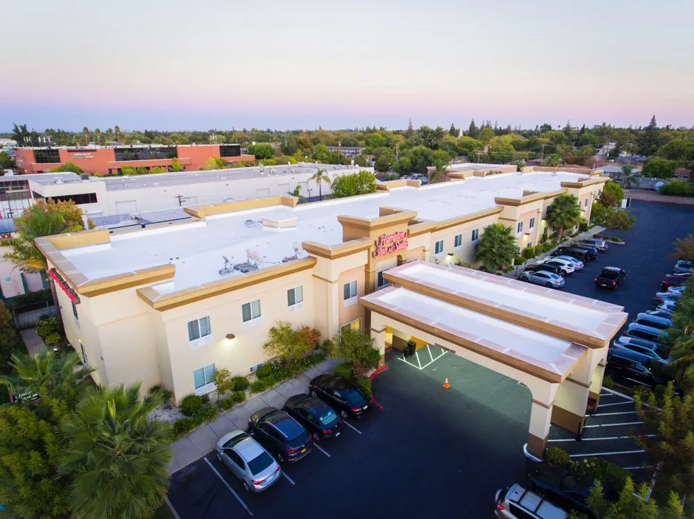 Slide of Flat Roof Pros