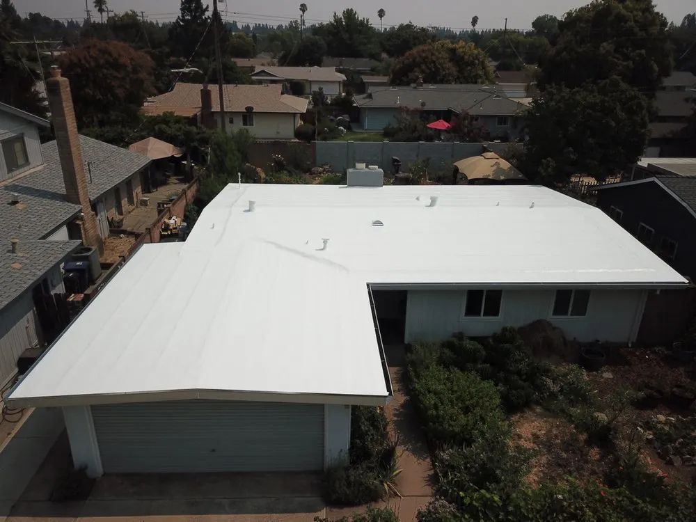 Slide of Flat Roof ProsFlat Roof Pros, Inc.