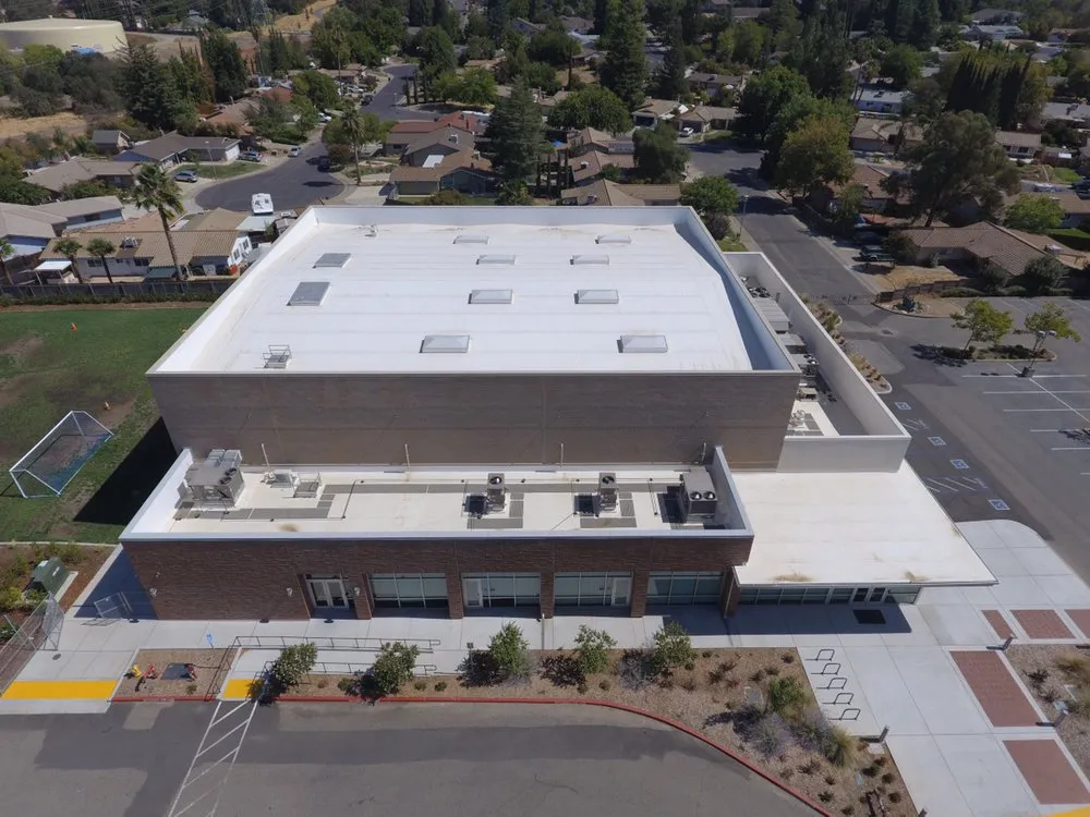 Slide of Flat Roof ProsFlat Roof Pros, Inc.