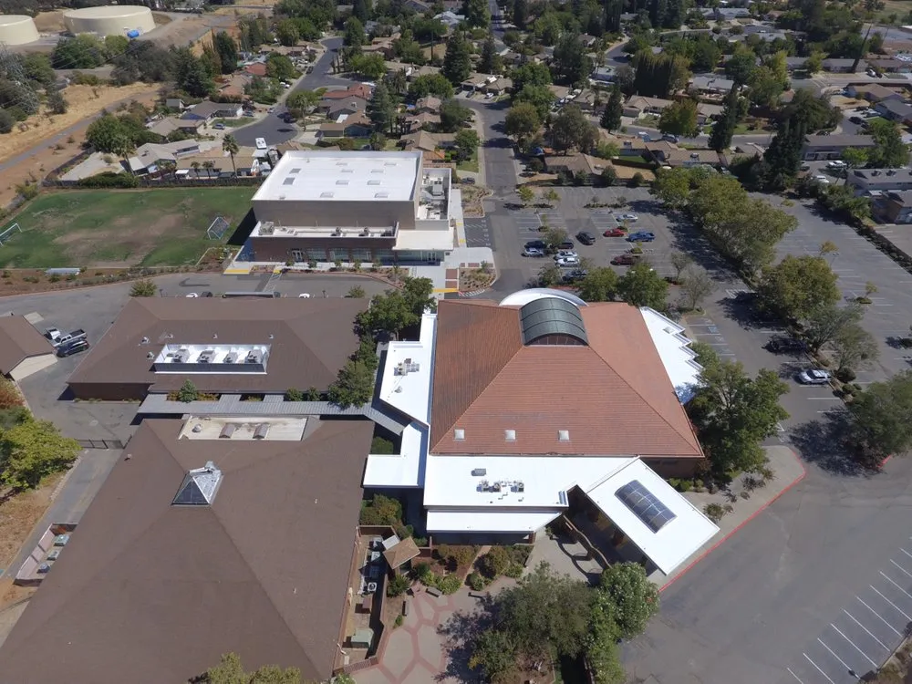 Slide of Flat Roof ProsFlat Roof Pros, Inc.