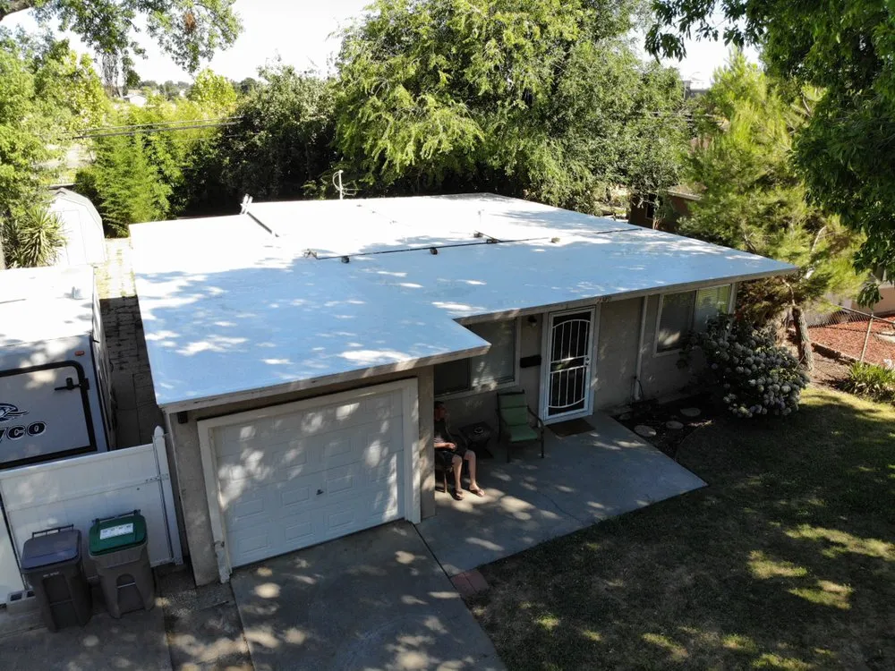 Slide of Flat Roof ProsFlat Roof Pros, Inc.