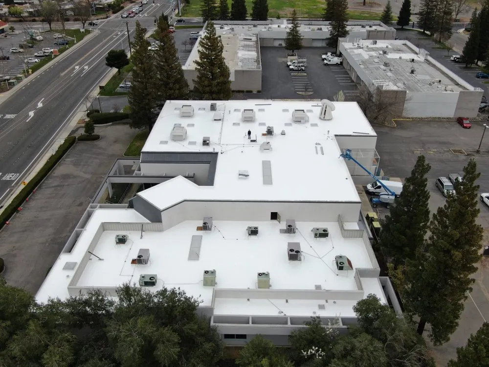 Slide of Flat Roof ProsFlat Roof Pros, Inc.