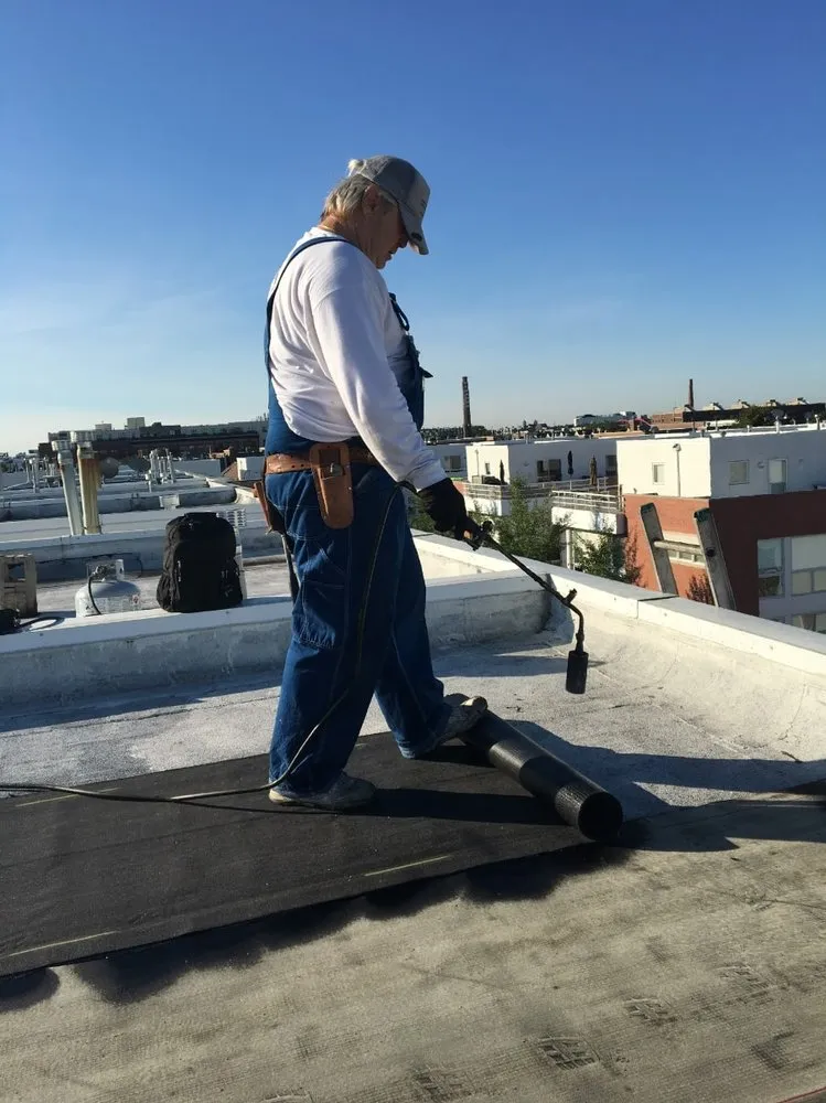 Slide of Flat Roof Repair