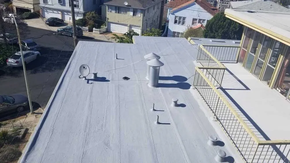 Slide of Flat Roofing Pros