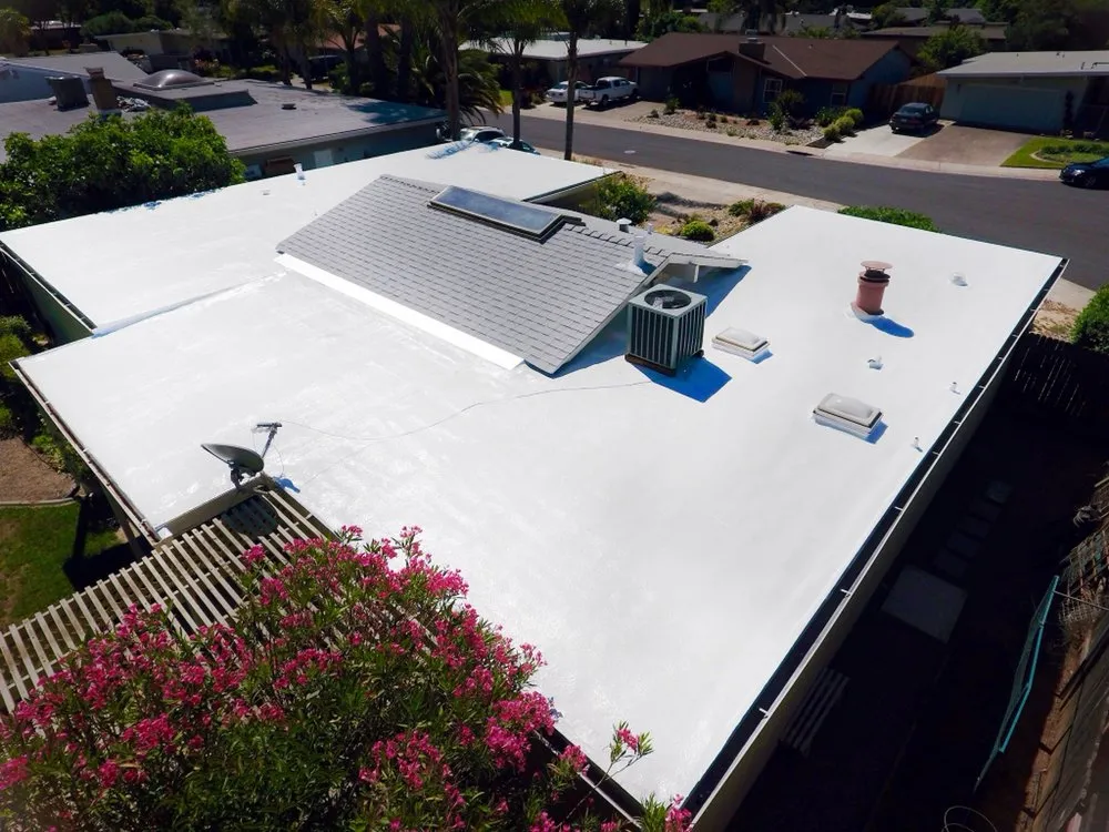 Slide of Flat Roofing Pros
