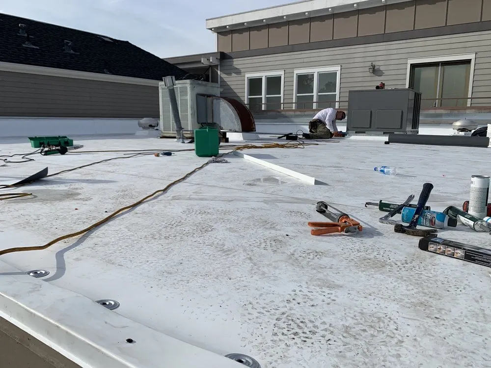 Slide of Flat Roofing Pros
