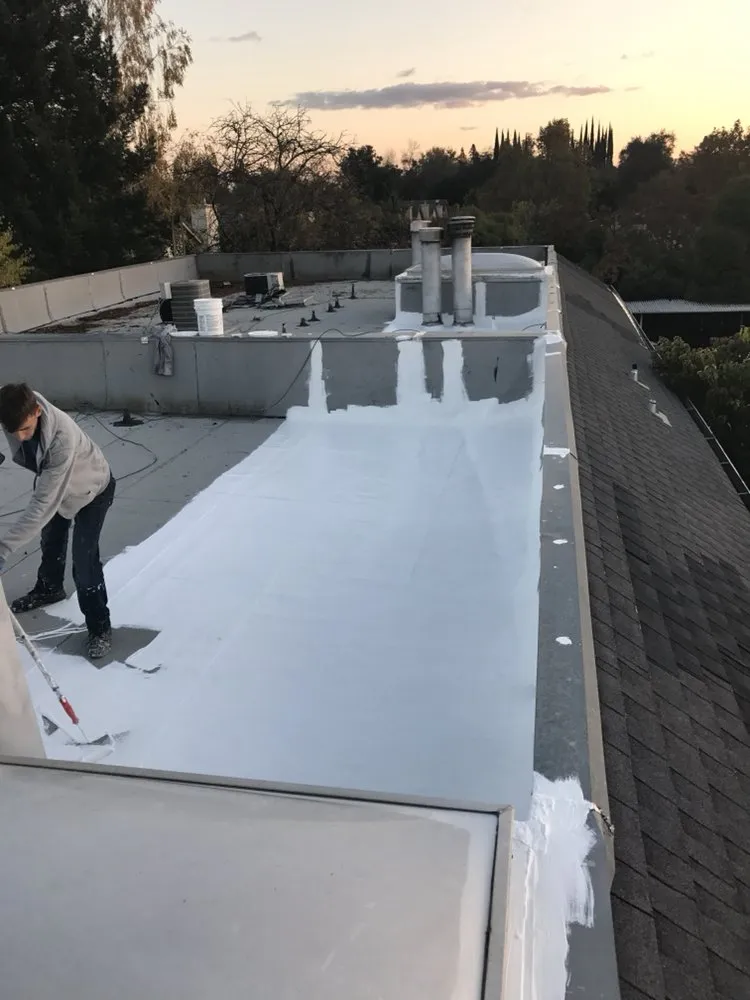 Slide of Flat Roofing Pros