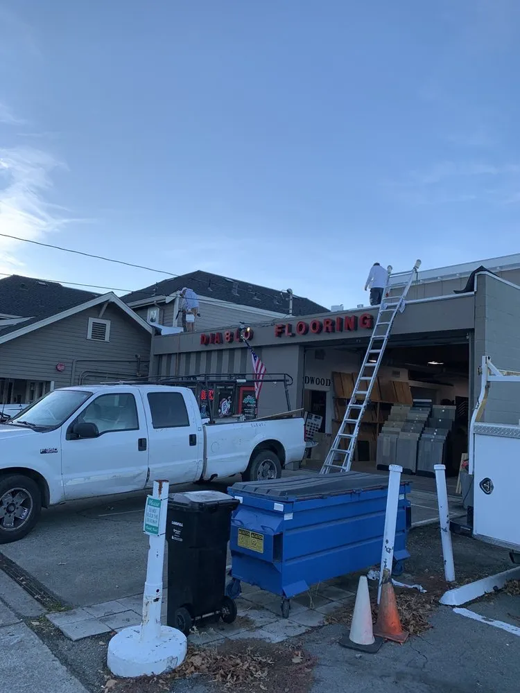 Slide of Flat Roofing Pros