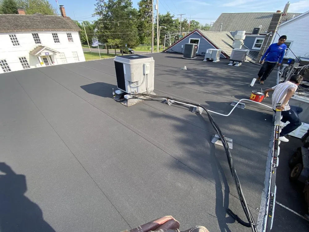 Slide of Flores Roofing