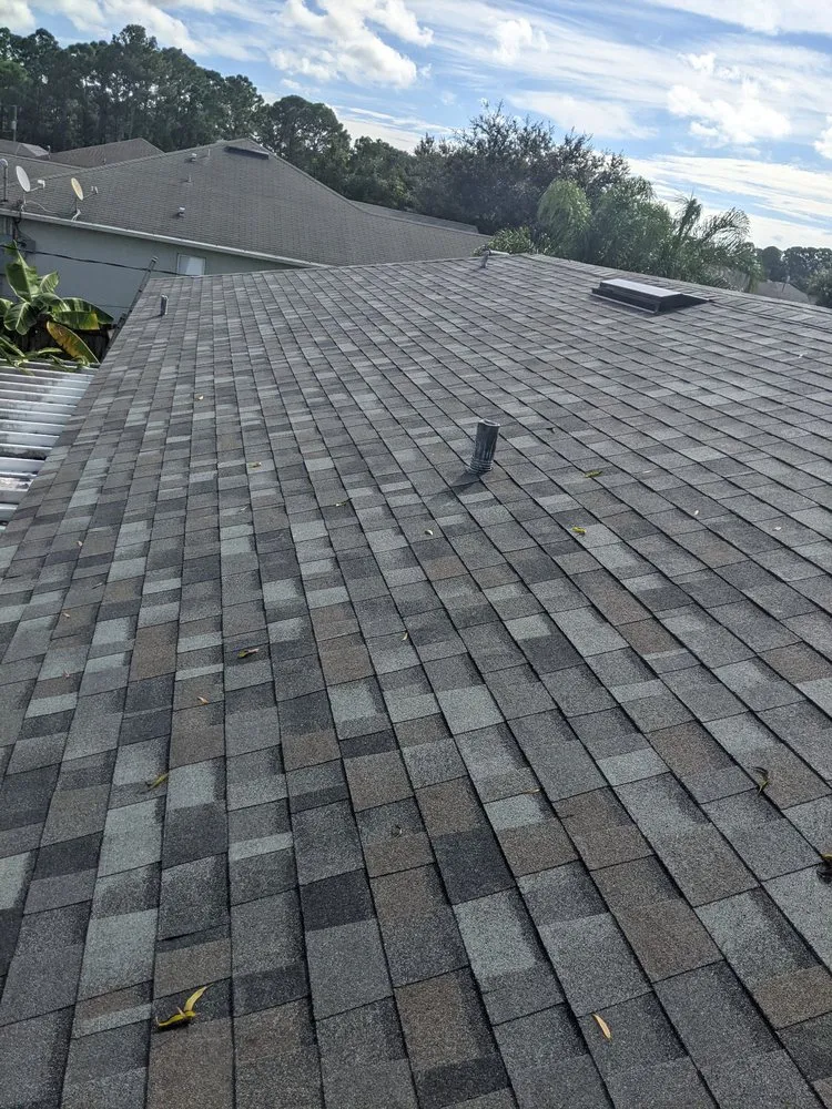 Slide of Florida Roof Bros