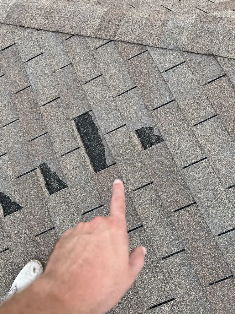 Trusted storm damage roof repair experts serving St. Petersburg, FL - Florida Roofing Specialists