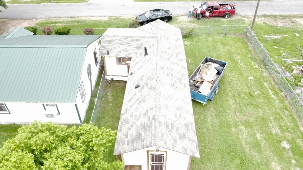 Licensed storm damage roof repair in Clayton, LA by Flournoy and Sons Roofing
