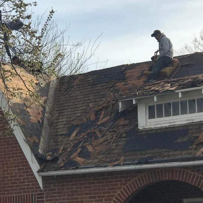 Slide of Flying Out Roofing