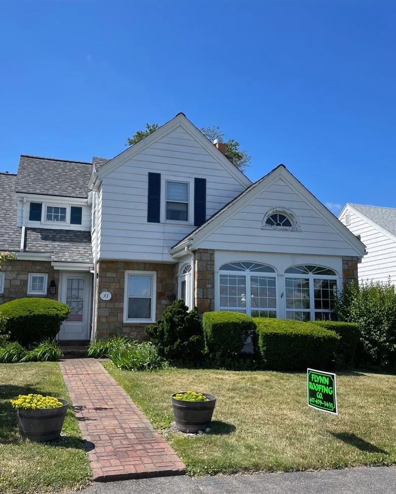 Slide of Flynn Roofing