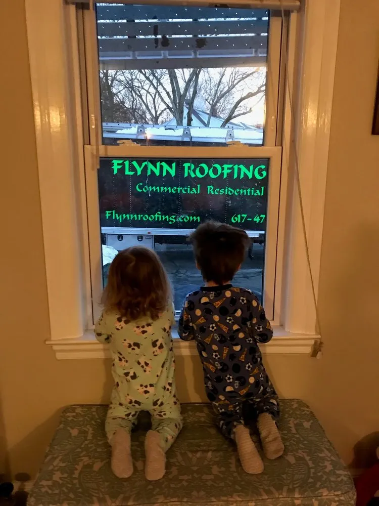 Slide of Flynn Roofing