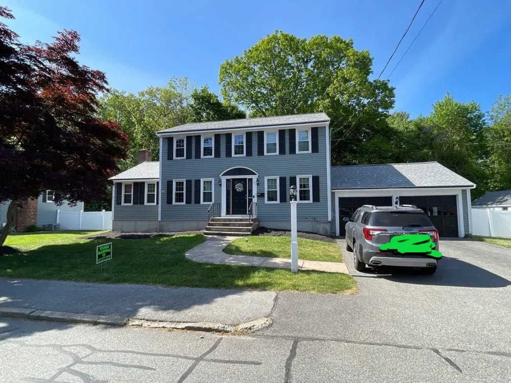 Slide of Flynn Roofing