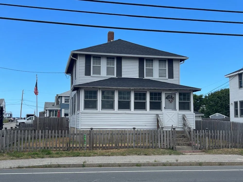 Slide of Flynn Roofing