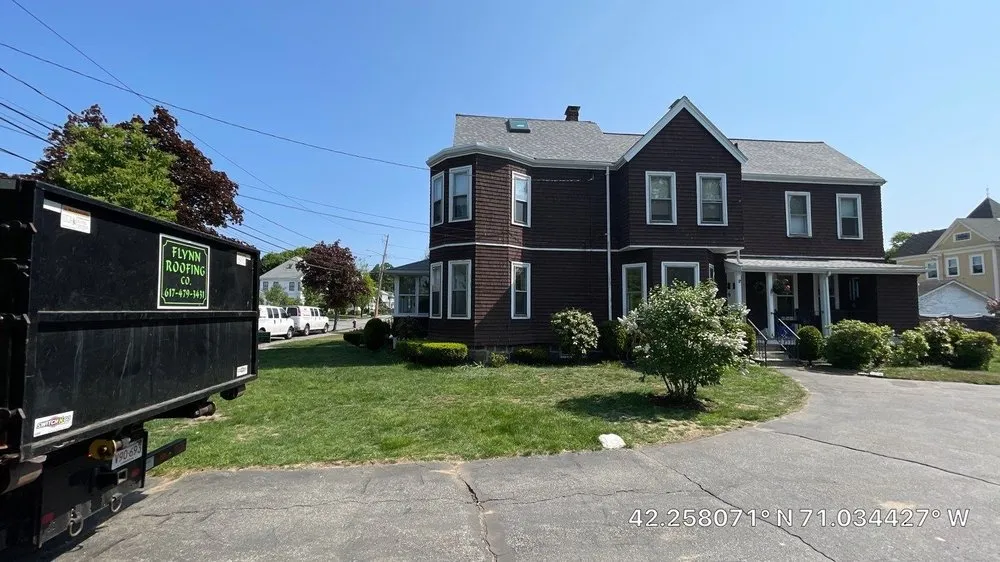 Slide of Flynn Roofing