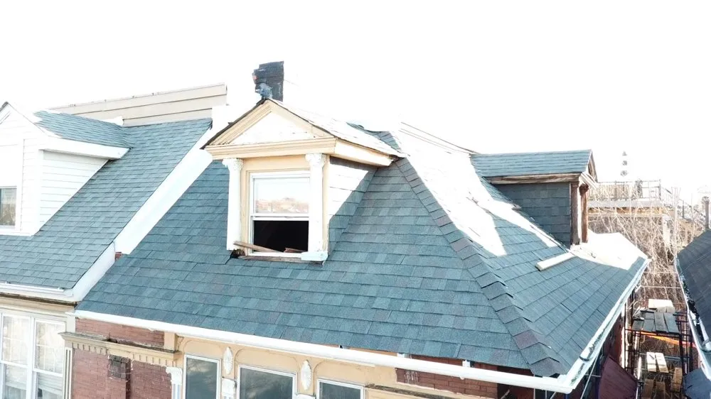 Slide of FM & Loonstyn Roofing