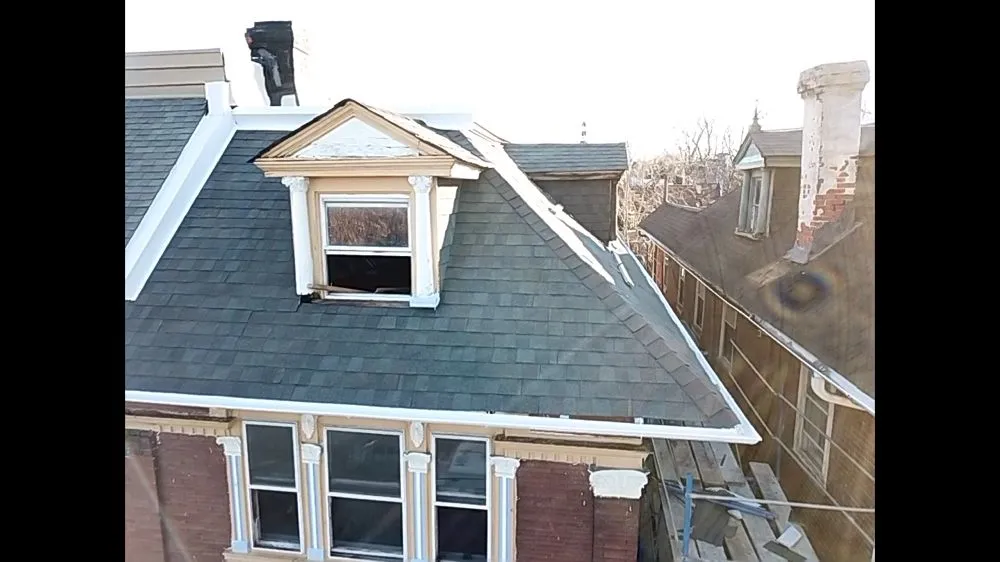 Slide of FM & Loonstyn Roofing