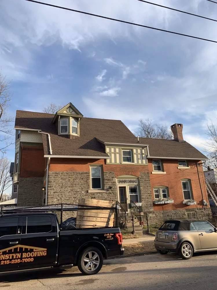 Slide of FM & Loonstyn Roofing