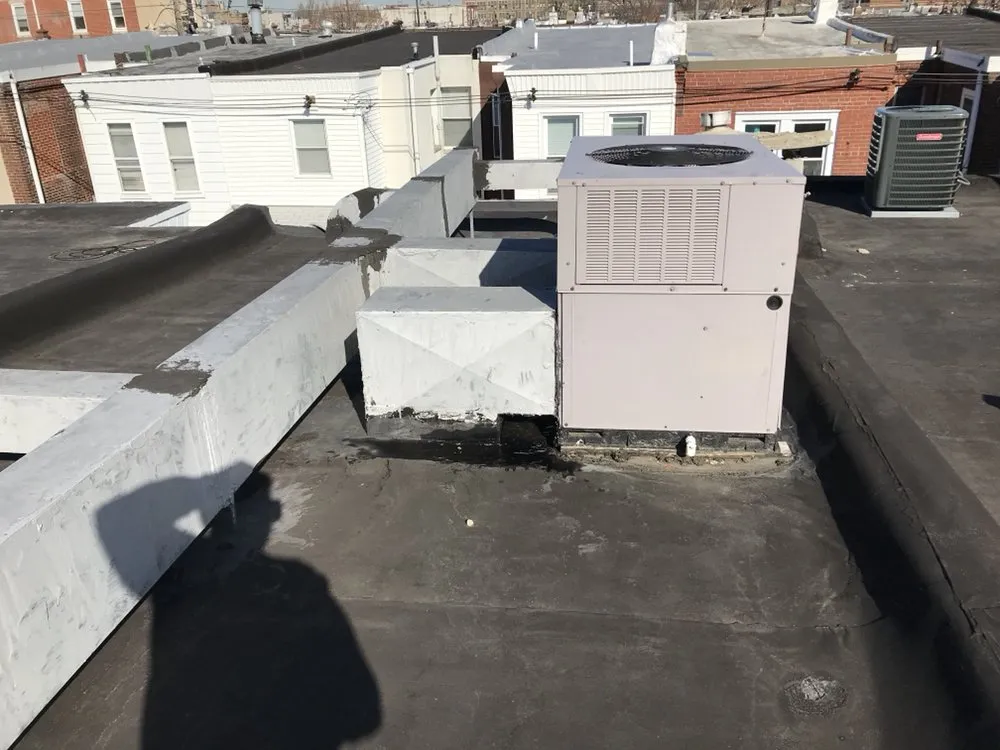 Slide of FM & Loonstyn Roofing