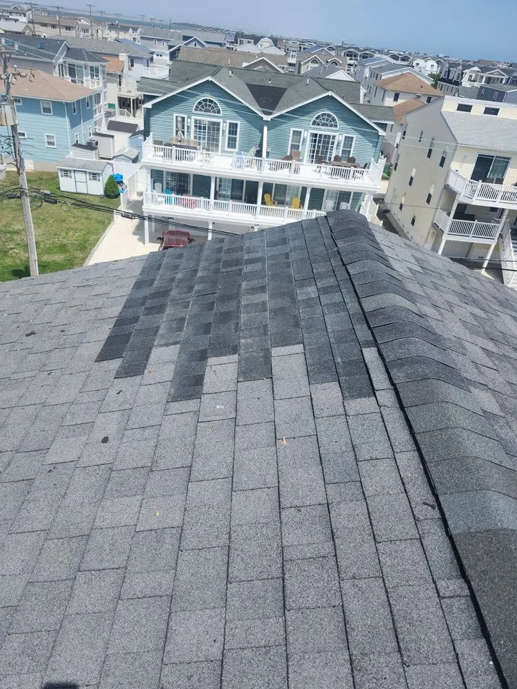 Slide of FM & Loonstyn Roofing