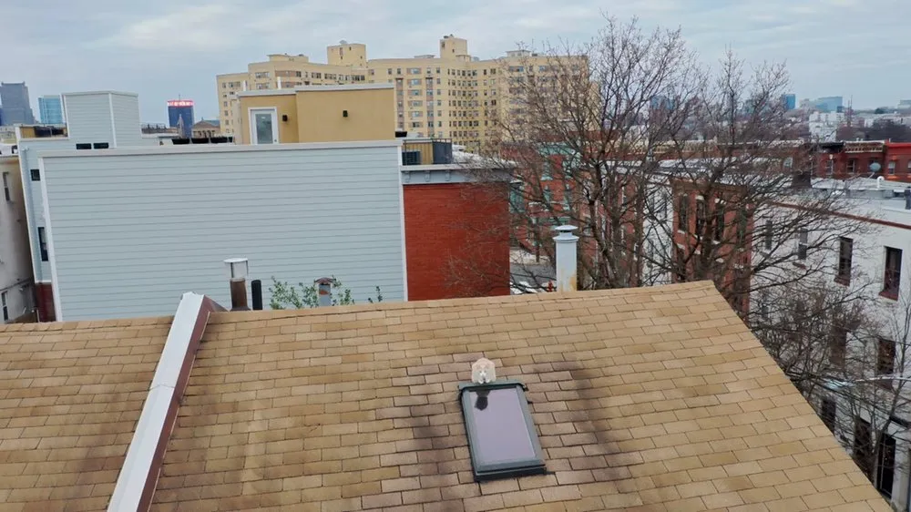 Slide of FM & Loonstyn Roofing