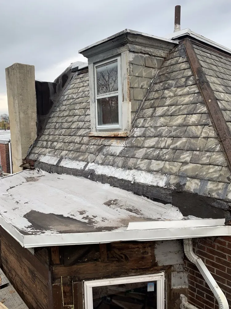 Slide of FM & Loonstyn Roofing