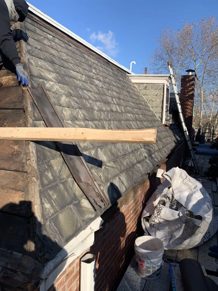 Slide of FM & Loonstyn Roofing