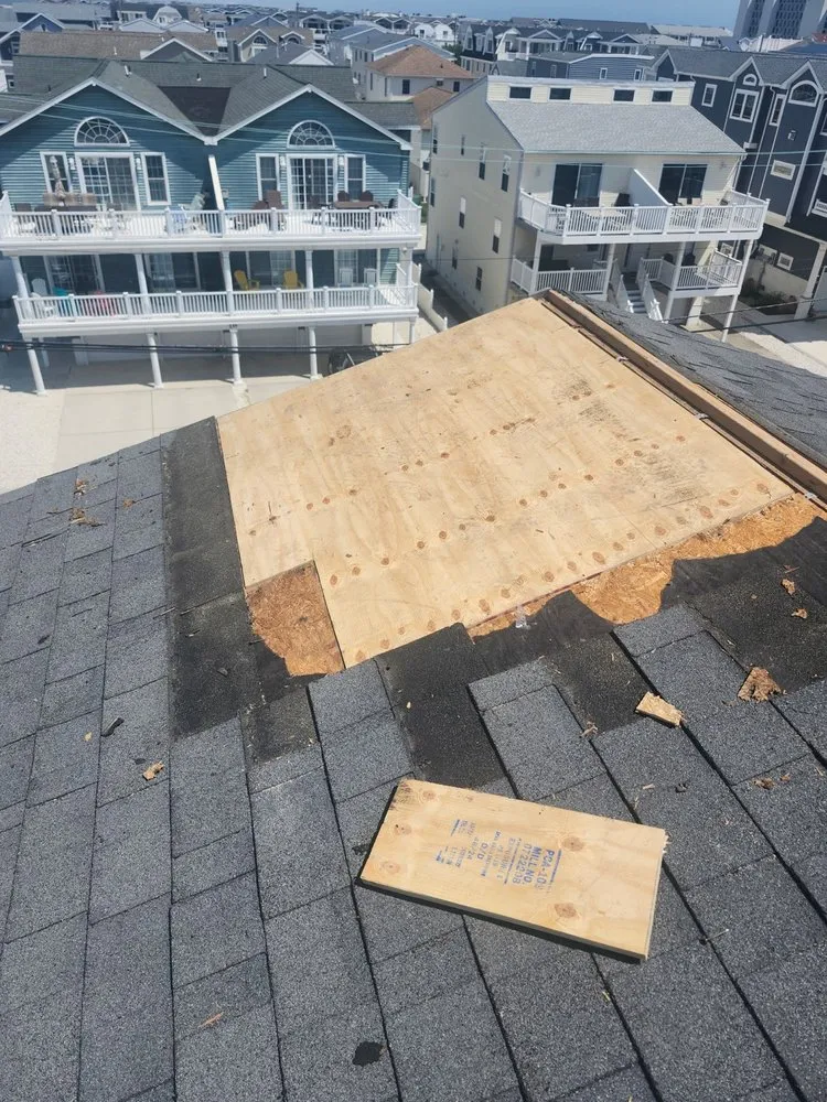 Slide of FM & Loonstyn Roofing