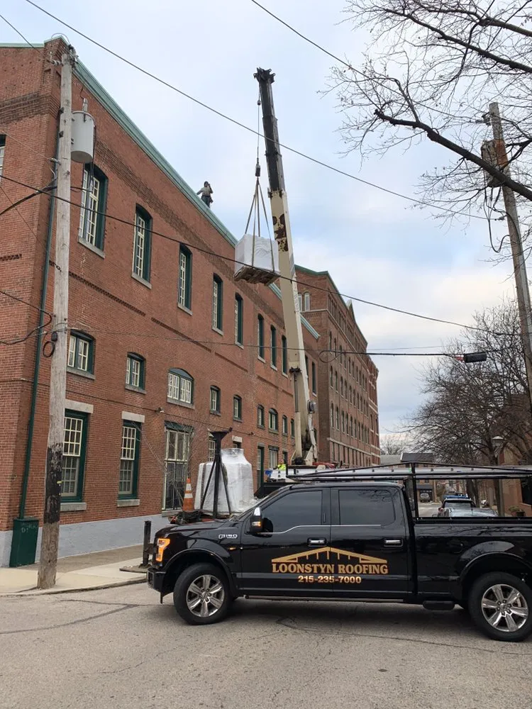 Slide of FM & Loonstyn Roofing