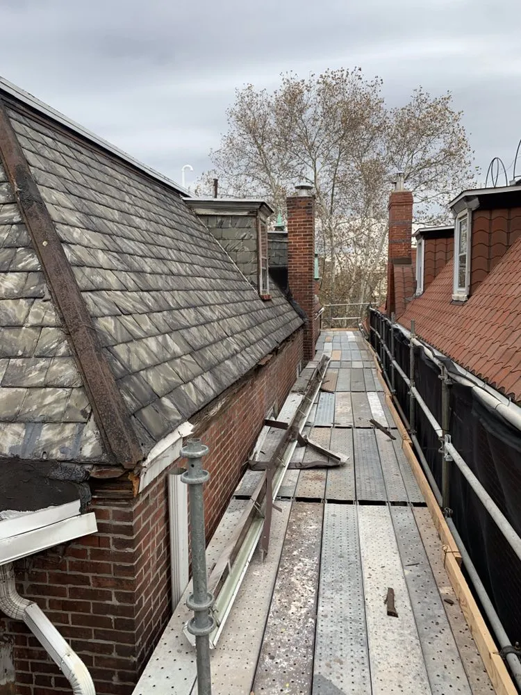 Slide of FM & Loonstyn Roofing