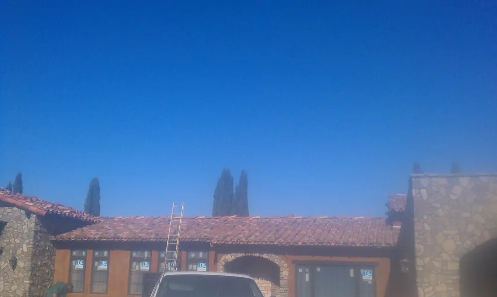 Slide of Foam Bond-A Quality Roofing