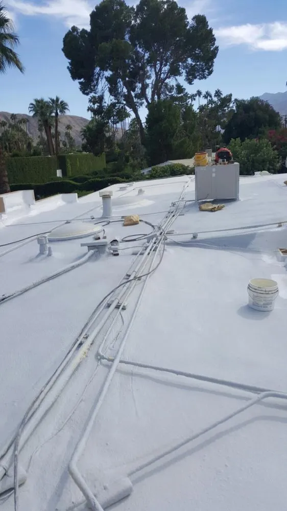 Slide of Foam Bond-A Quality Roofing