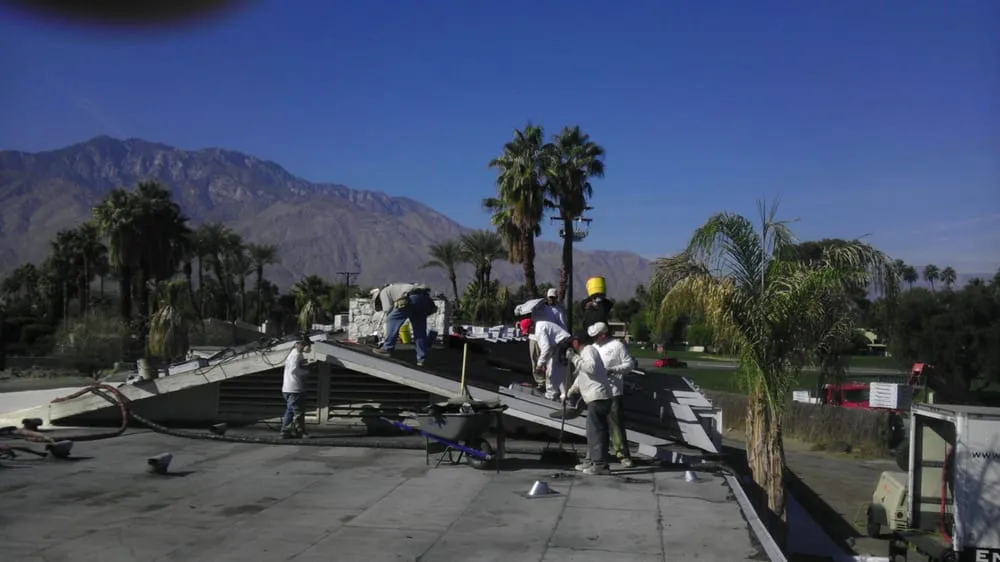 Slide of Foam Bond-A Quality Roofing