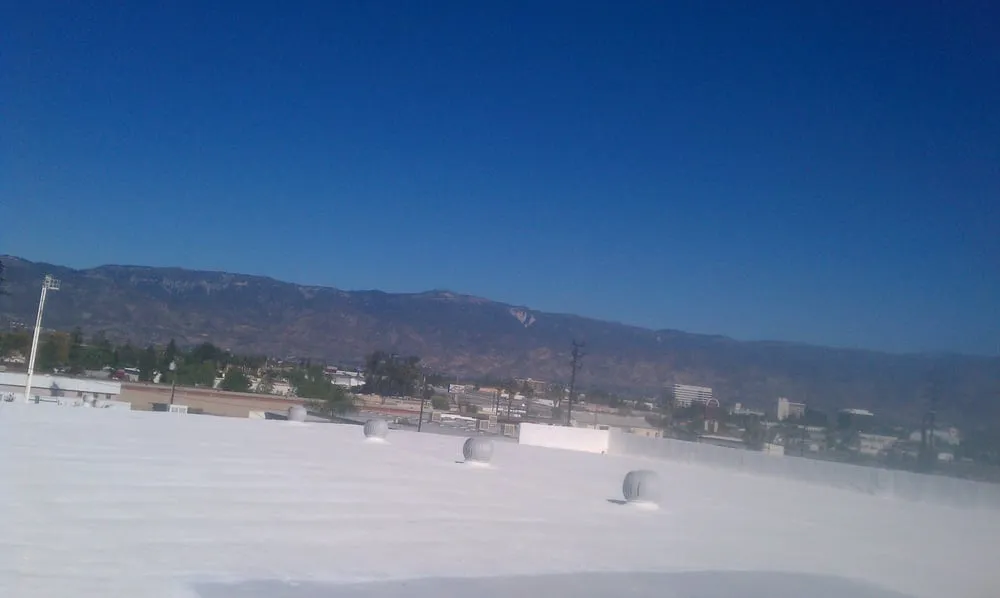 Slide of Foam Bond-A Quality Roofing