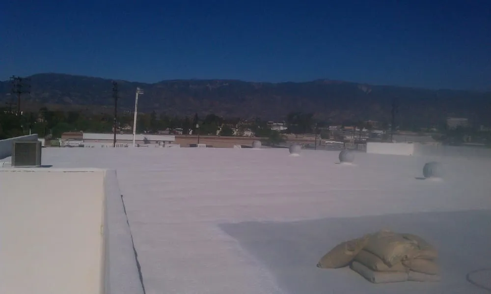 Slide of Foam Bond-A Quality Roofing