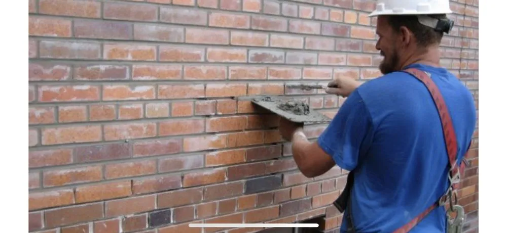 Slide of Foley Tuckpointing & Roofing