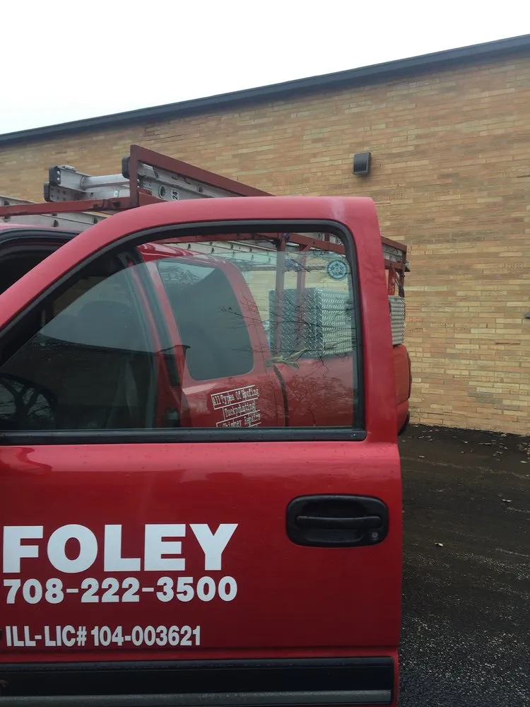 Slide of Foley Tuckpointing & Roofing